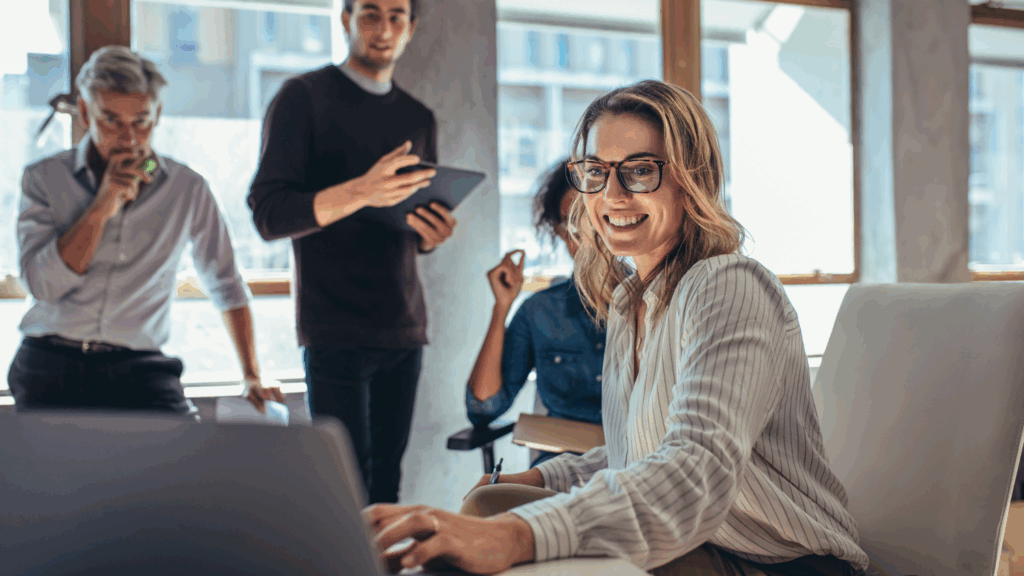 A group of people working in an office.