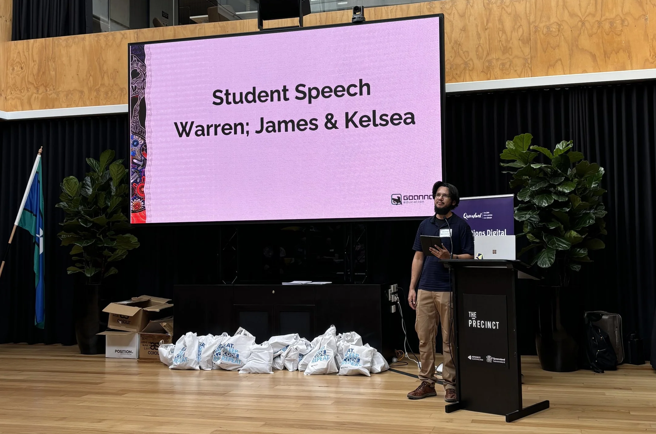 A photo of a person giving a presentation.