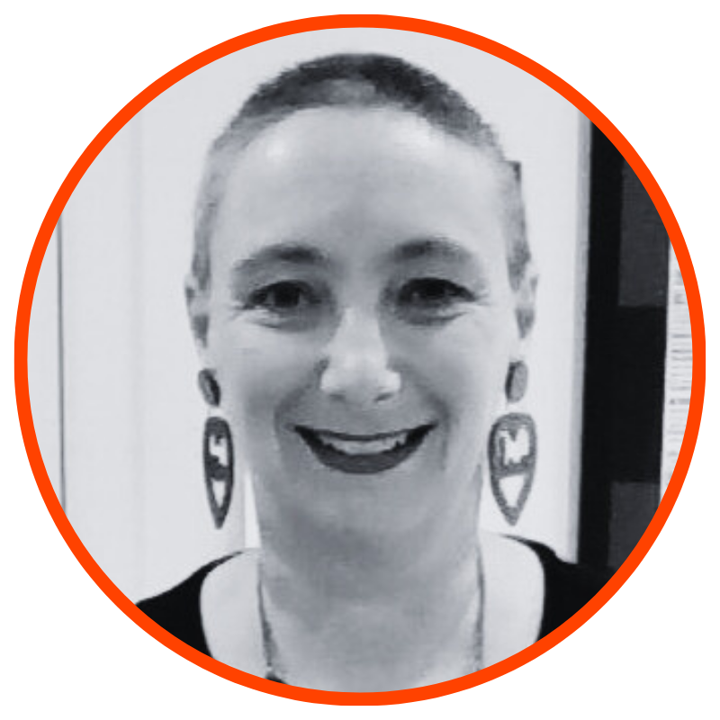 A photo of a person smiling at the camera.