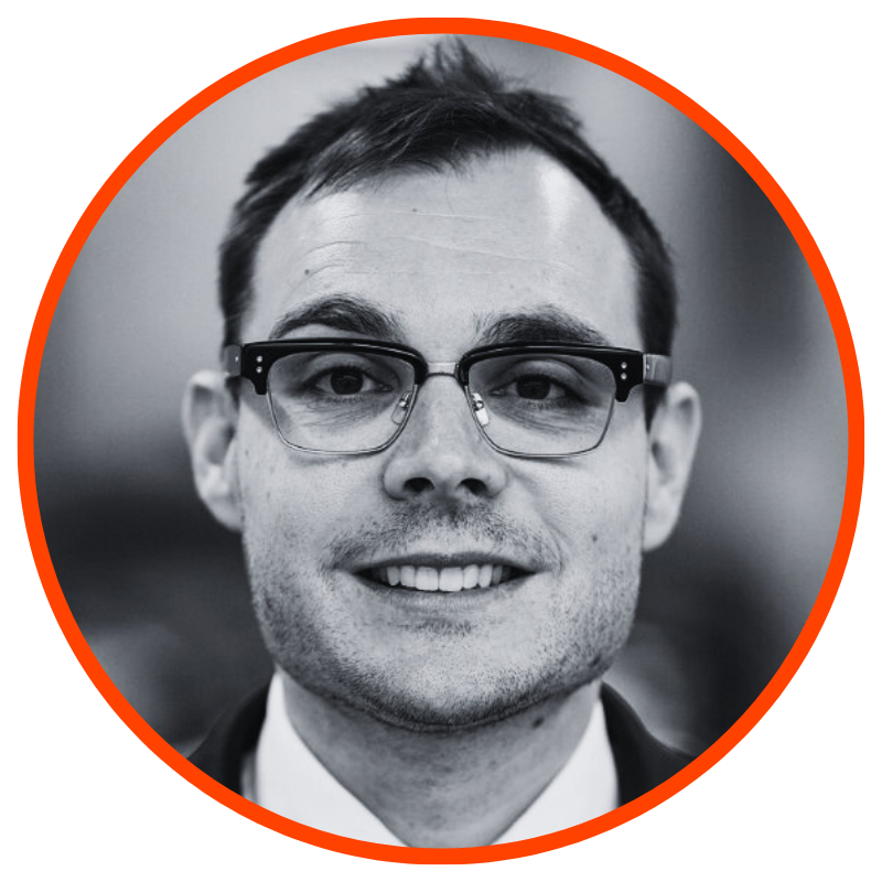 A photo of a person smiling at the camera.